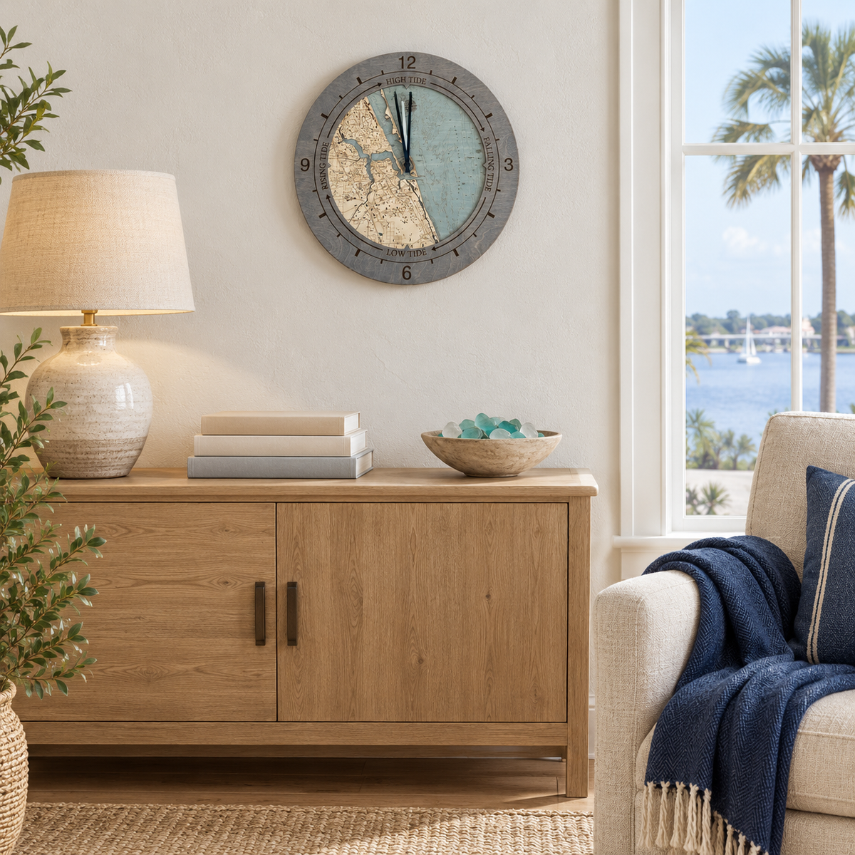 Stuart, Florida tide and time clock hanging on the wall in a coastal living room