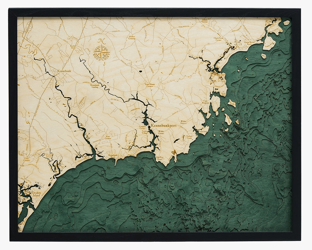 Kennebunkport, Maine 3D layered wood map in laser-cut Baltic birch, shown framed against a light wall