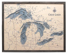 Great Lakes 3D layered wood map in laser-cut Baltic birch, shown framed against a light wall