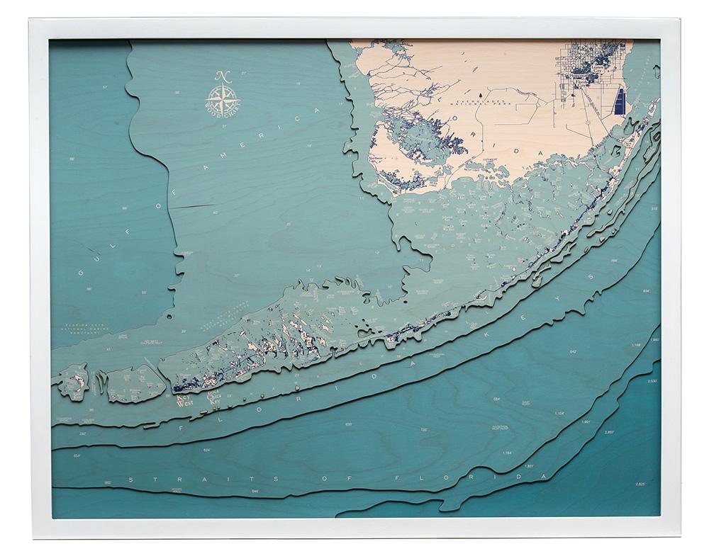 Florida Keys 3D layered wood map in laser-cut Baltic birch, shown framed against a light wall