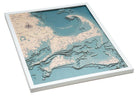 Cape Cod, Massachusetts 3D layered wood map in laser-cut Baltic birch, shown framed against a light wall