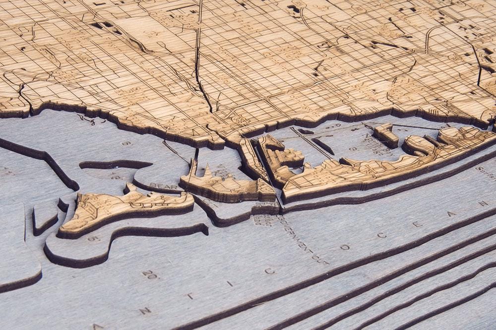 Key Largo to Fort Lauderdale, Florida 3D layered wood map in laser-cut Baltic birch, shown framed against a light wall