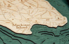 Mackinac Island, Michigan 3D layered wood map in laser-cut Baltic birch, shown framed against a light wall
