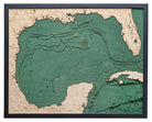 Gulf Of America 3D layered wood map in laser-cut Baltic birch, shown framed against a light wall