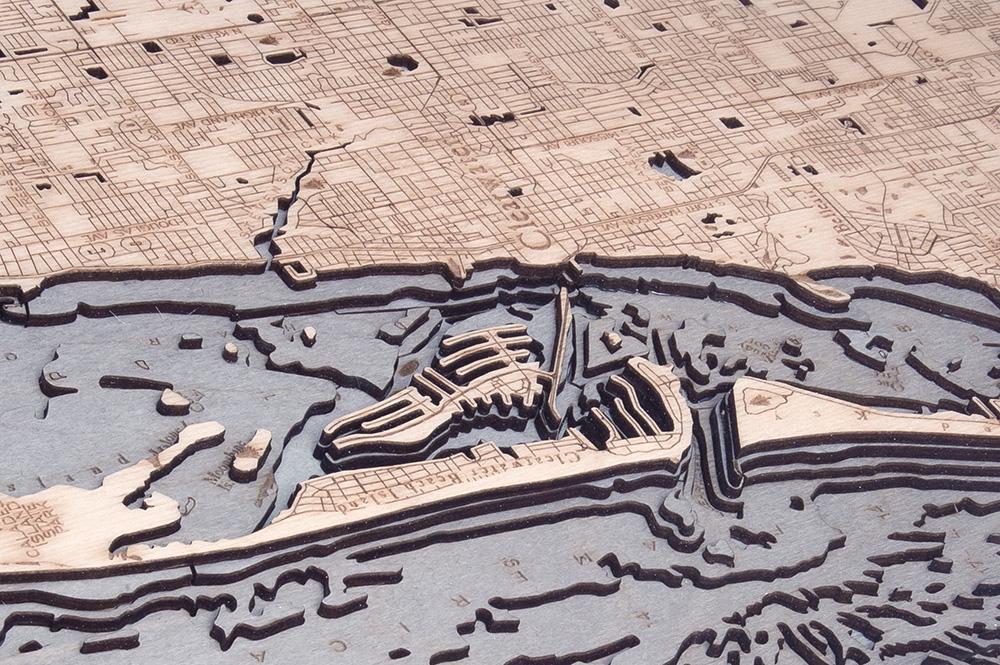 Anclote Key to Indian Shores, Florida 3D layered wood map in laser-cut Baltic birch, shown framed against a light wall