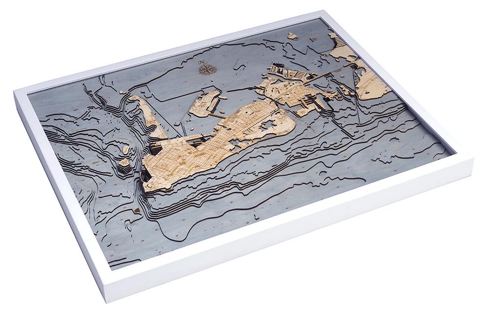 Key West, Florida 3D layered wood map in laser-cut Baltic birch, shown framed against a light wall