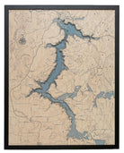 Lake Coeur d'Alene, Idaho 3D layered wood map in laser-cut Baltic birch, shown framed against a light wall