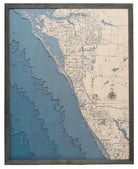 Sarasota to Venice, Florida 3D layered wood map in laser-cut Baltic birch, shown framed against a light wall