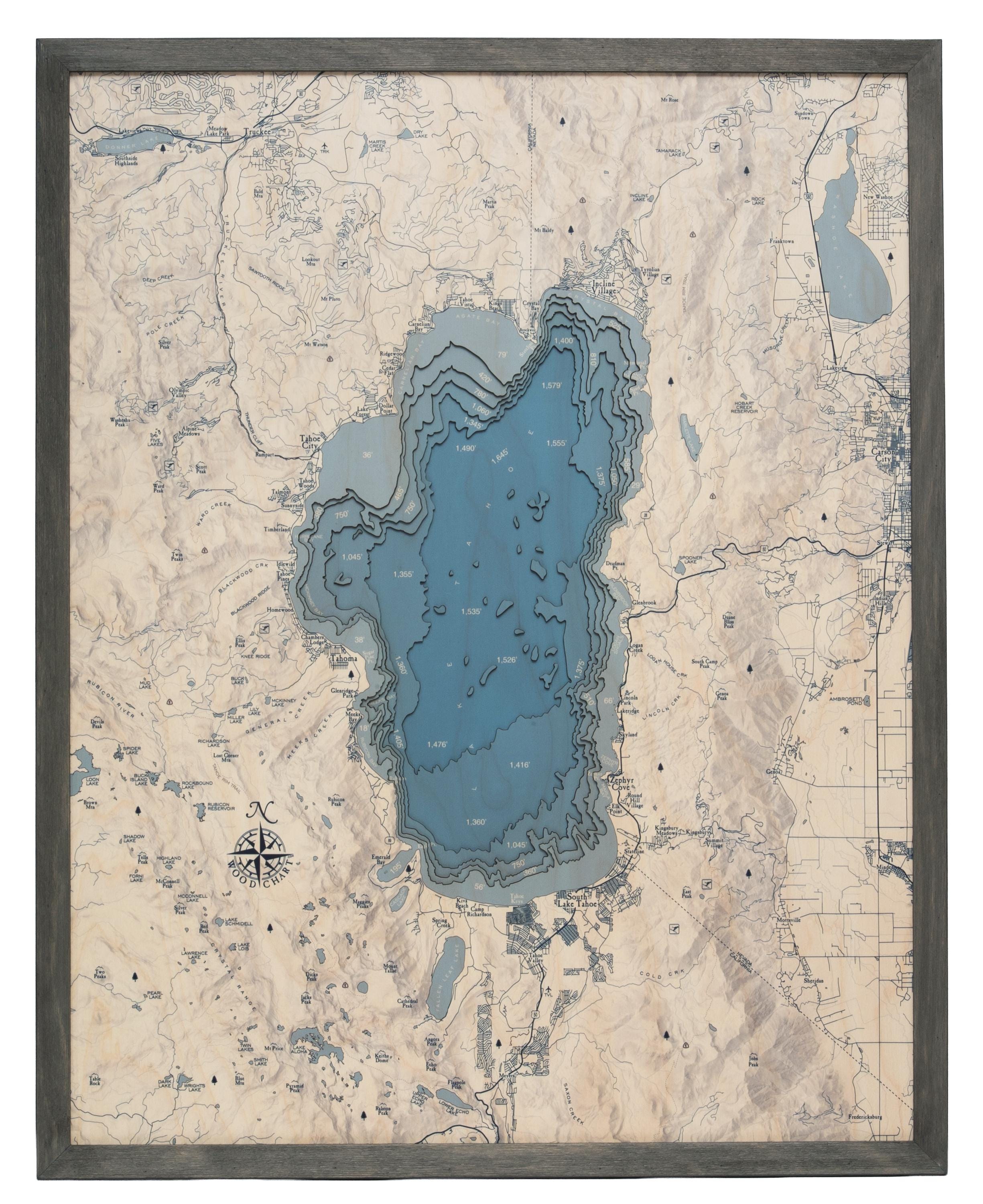 Lake Tahoe, California 3D layered wood map in laser-cut Baltic birch, shown framed against a light wall