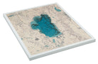 Lake Tahoe, California 3D layered wood map in laser-cut Baltic birch, shown framed against a light wall