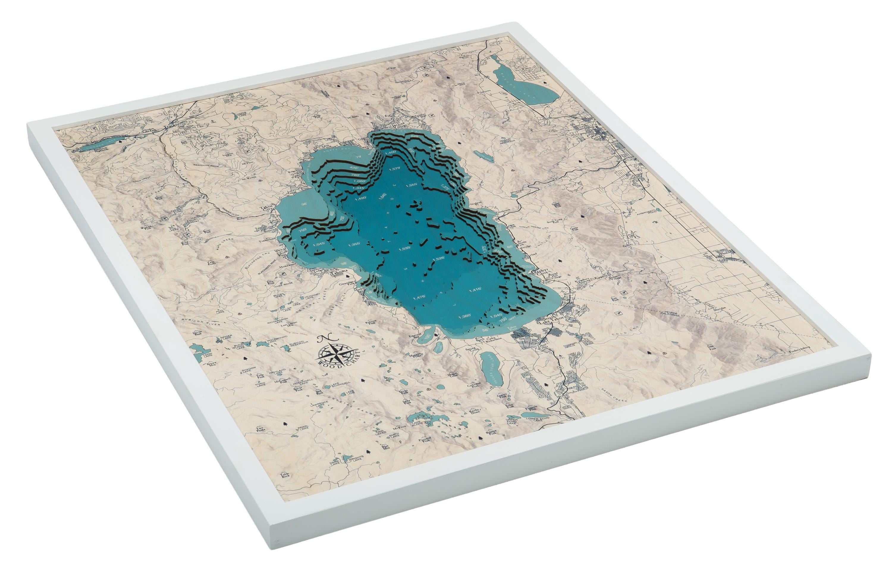 Lake Tahoe, California 3D layered wood map in laser-cut Baltic birch, shown framed against a light wall