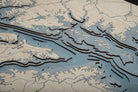 Chesapeake Bay, Maryland 3D layered wood map in laser-cut Baltic birch, shown framed against a light wall