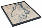 Puget Sound, Washington 3D layered wood map in laser-cut Baltic birch, shown framed against a light wall