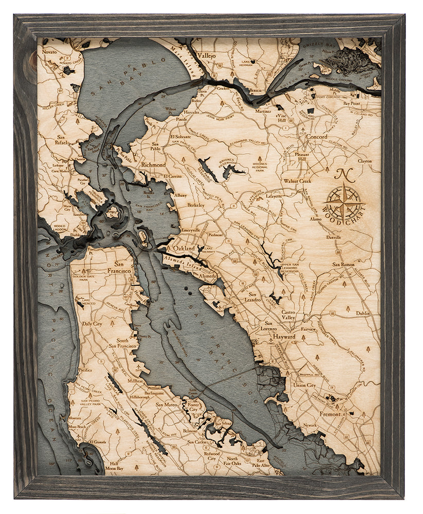 San Francisco, California 3D layered wood map in laser-cut Baltic birch, shown framed against a light wall