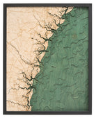 Georgia Coast 3D layered wood map in laser-cut Baltic birch, shown framed against a light wall