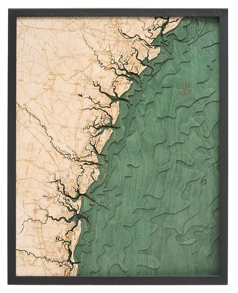 Georgia Coast 3D layered wood map in laser-cut Baltic birch, shown framed against a light wall