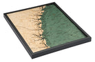 Georgia Coast 3D layered wood map in laser-cut Baltic birch, shown framed against a light wall