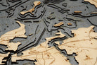 Boston Harbor, Massachusetts 3D layered wood map in laser-cut Baltic birch, shown framed against a light wall