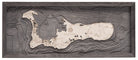 Grand Cayman, Caribbean 3D layered wood map in laser-cut Baltic birch, shown framed against a light wall