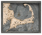 Cape Cod, Massachusetts 3D layered wood map in laser-cut Baltic birch, shown framed against a light wall