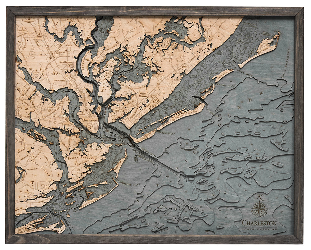 Charleston, South Carolina 3D layered wood map in laser-cut Baltic birch, shown framed against a light wall