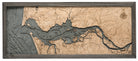 Columbia River Mouth, Oregon 3D layered wood map in laser-cut Baltic birch, shown framed against a light wall