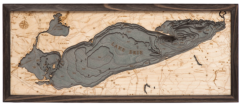 Lake Erie 3D layered wood map in laser-cut Baltic birch, shown framed against a light wall