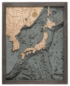 Japan 3D layered wood map in laser-cut Baltic birch, shown framed against a light wall