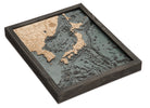 Japan 3D layered wood map in laser-cut Baltic birch, shown framed against a light wall