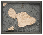 Maui, Hawaii 3D layered wood map in laser-cut Baltic birch, shown framed against a light wall