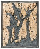 Narragansett Bay & Newport, Rhode Island 3D layered wood map in laser-cut Baltic birch, shown framed against a light wall