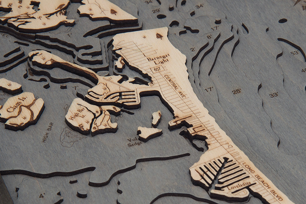 Long Beach Island, New Jersey 3D layered wood map in laser-cut Baltic birch, shown framed against a light wall