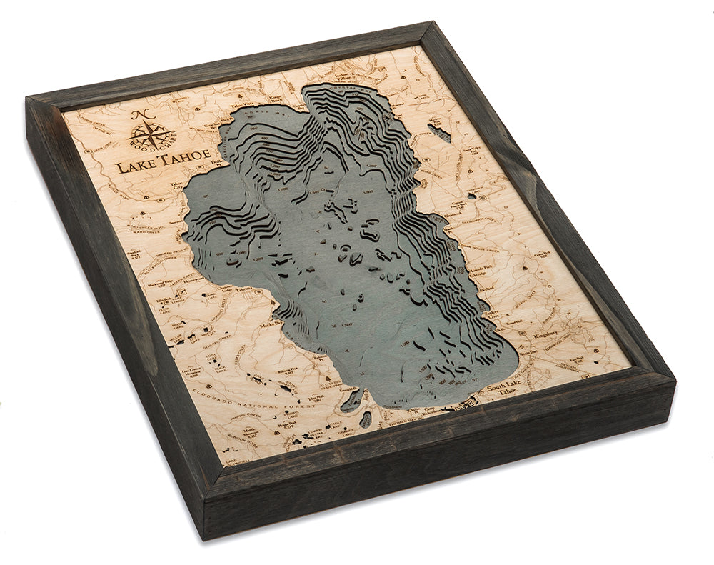 Lake Tahoe, California 3D layered wood map in laser-cut Baltic birch, shown framed against a light wall