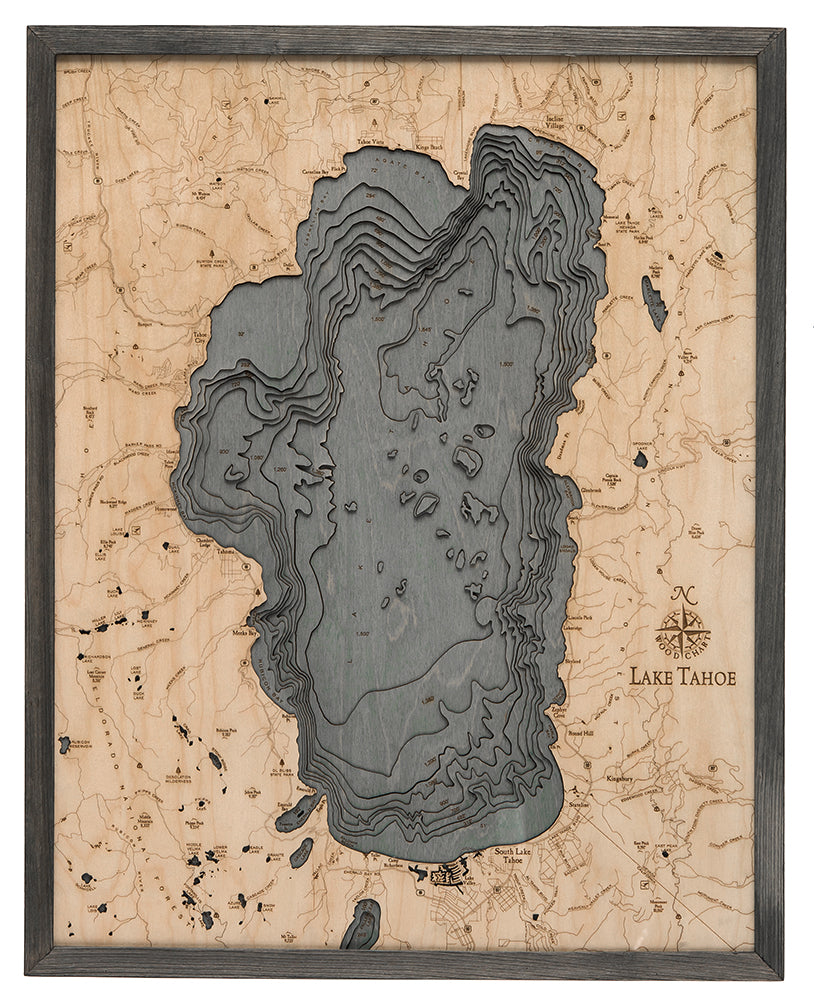 Lake Tahoe, California 3D layered wood map in laser-cut Baltic birch, shown framed against a light wall