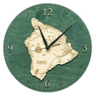 The Big Island, Hawaii wood wall clock in laser-cut Baltic birch, shown framed against a light wall