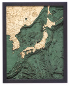 Japan 3D layered wood map in laser-cut Baltic birch, shown framed against a light wall