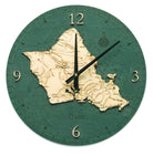 Oahu, Hawaii wood wall clock in laser-cut Baltic birch, shown framed against a light wall