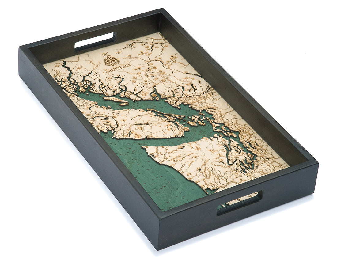 Salish Sea, Washington wood serving tray in laser-cut Baltic birch, shown framed against a light wall