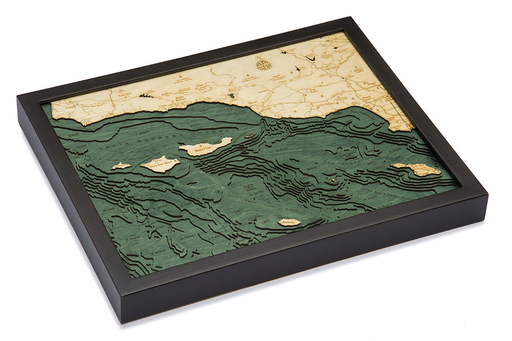 Santa Barbara, California 3D layered wood map in laser-cut Baltic birch, shown framed against a light wall