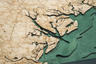 South Carolina Coast 3D layered wood map in laser-cut Baltic birch, shown framed against a light wall