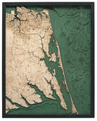 Virginia Beach to Kitty Hawk 3D layered wood map in laser-cut Baltic birch, shown framed against a light wall
