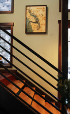 Salish Sea, Washington 3D layered wood map in laser-cut Baltic birch, shown framed against a light wall