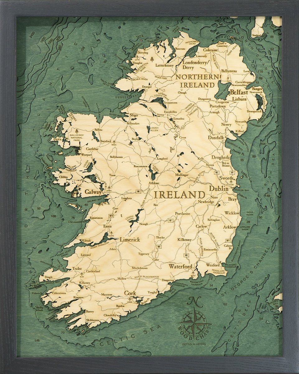 Ireland 3D layered wood map in laser-cut Baltic birch, shown framed against a light wall