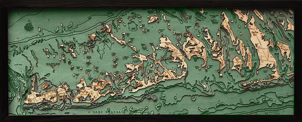 Florida Keys 3D layered wood map in laser-cut Baltic birch, shown framed against a light wall