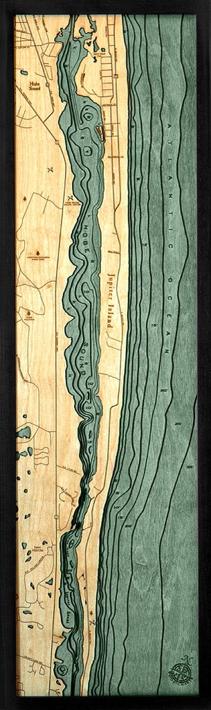 Jupiter Island, Florida 3D layered wood map in laser-cut Baltic birch, shown framed against a light wall