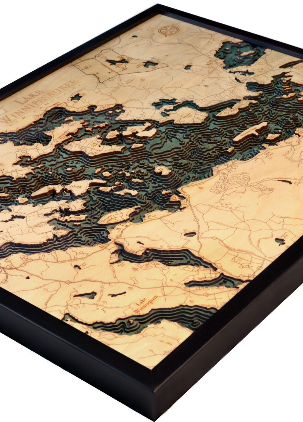 Lake Winnipesaukee, New Hampshire 3D layered wood map in laser-cut Baltic birch, shown framed against a light wall