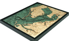 Tampa Bay, Florida 3D layered wood map in laser-cut Baltic birch, shown framed against a light wall