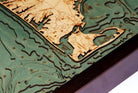 Cape Cod, Massachusetts 3D layered wood map in laser-cut Baltic birch, shown framed against a light wall