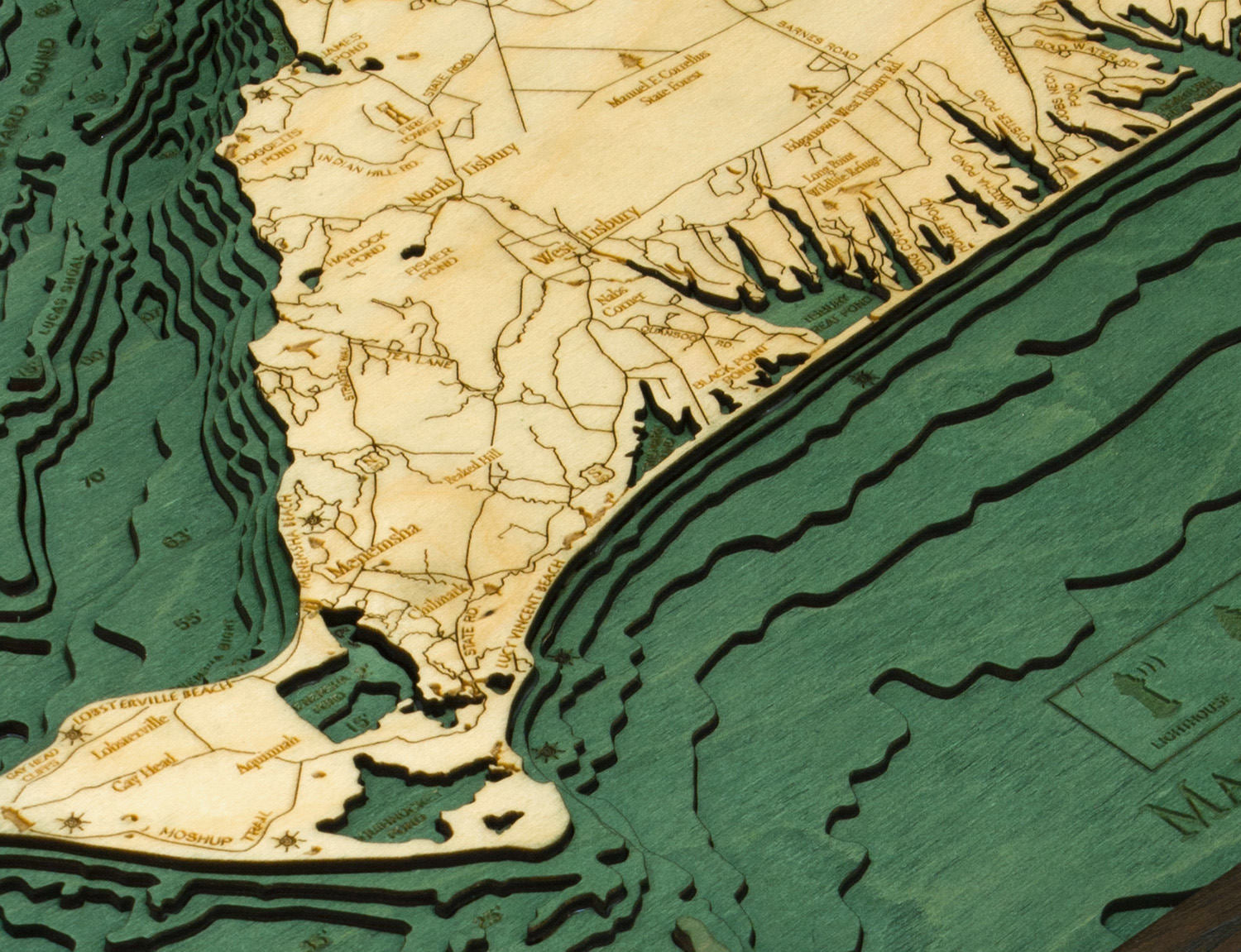 Martha's Vineyard, Massachusetts 3D layered wood map in laser-cut Baltic birch, shown framed against a light wall