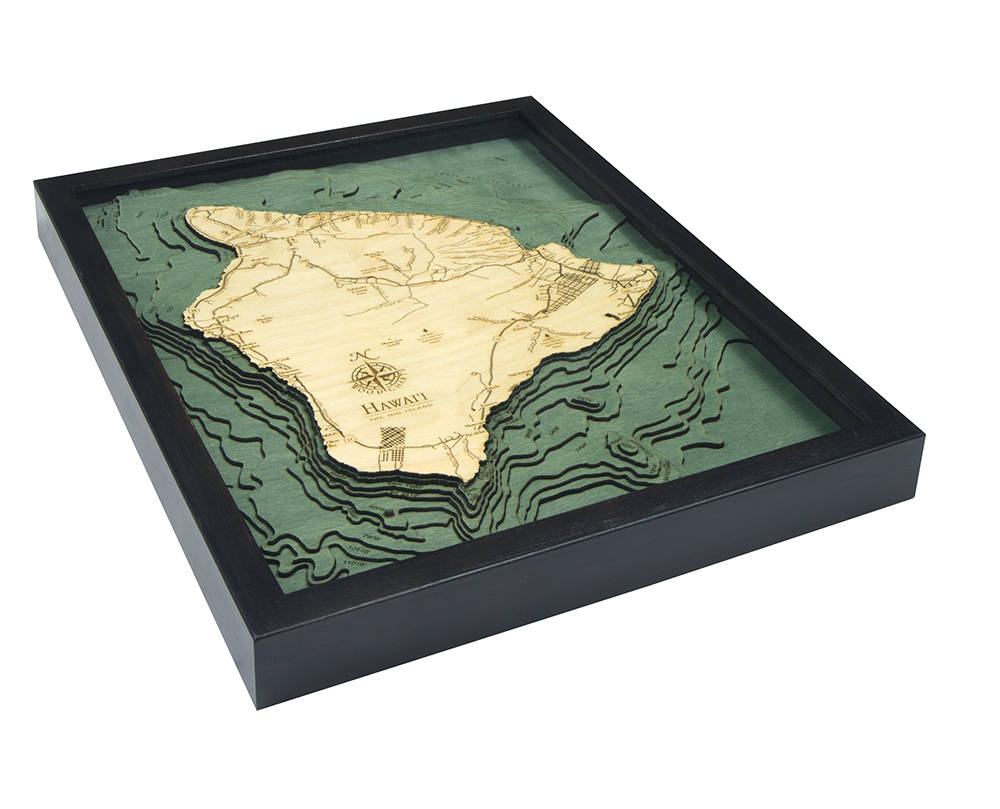 The Big Island, Hawaii 3D layered wood map in laser-cut Baltic birch, shown framed against a light wall
